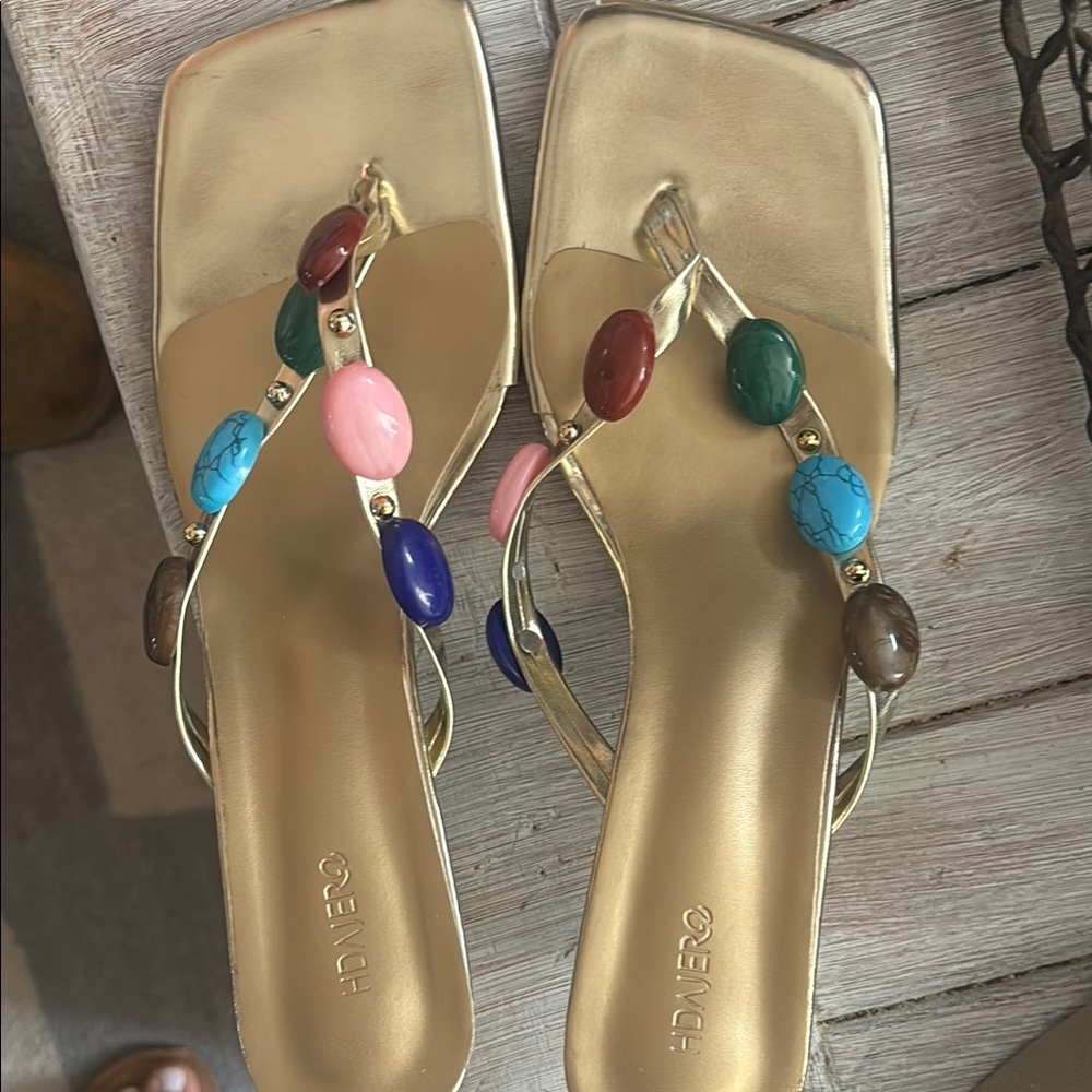Have Gold and Pink Sandals with Jewel Embellishments